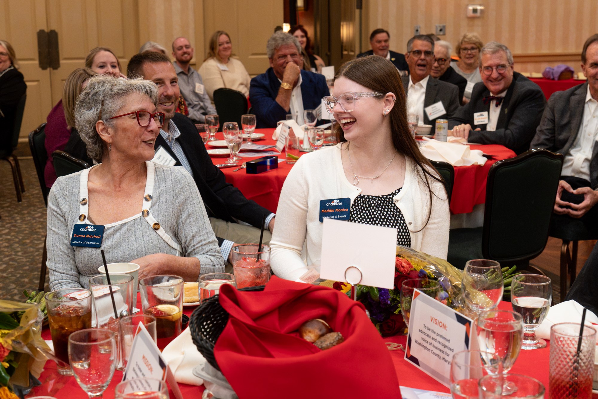Attendees laughing together during the Chamber Annual Meeting