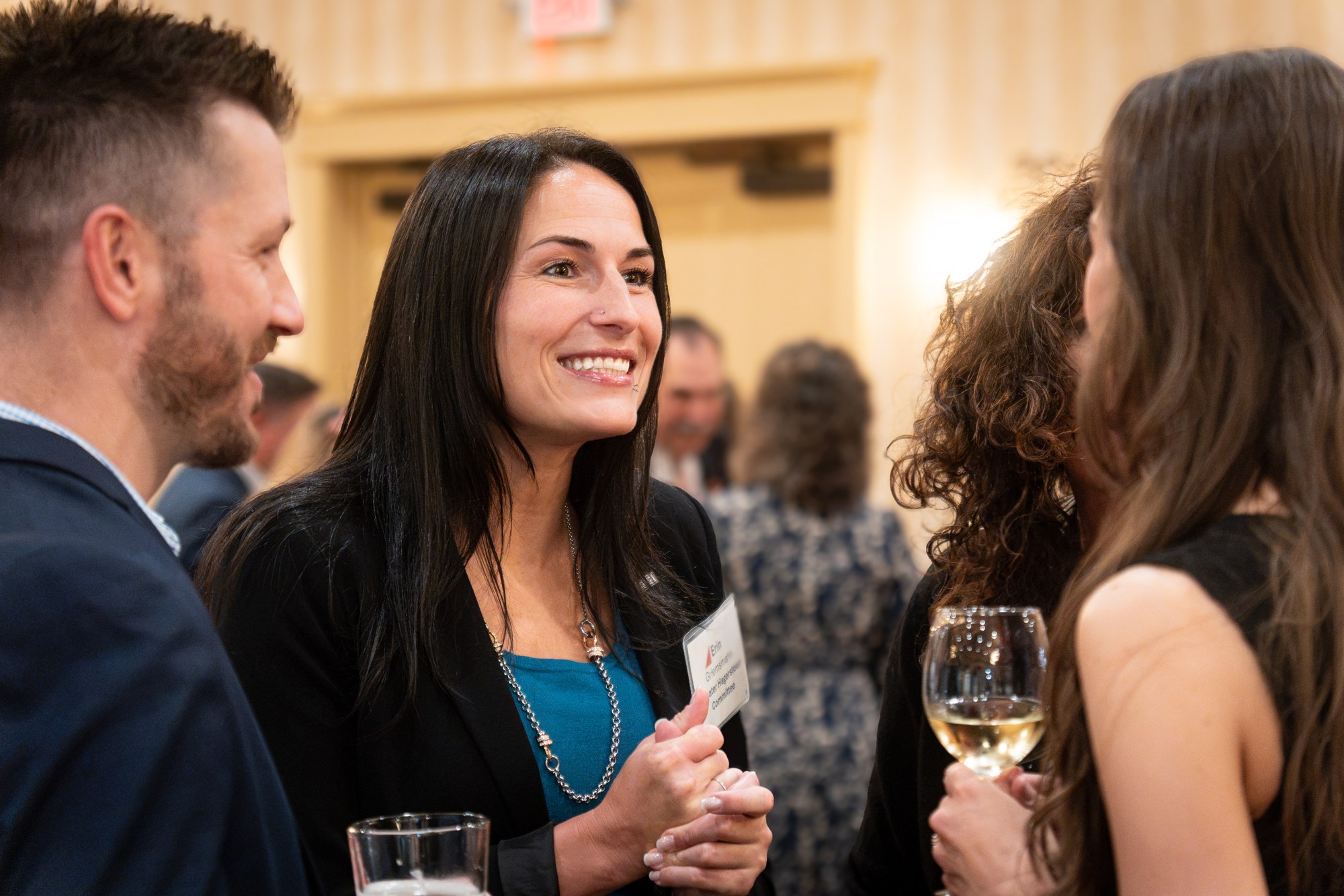 Guests sharing a conversation at a professional networking event